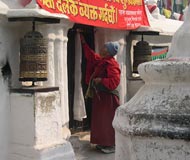 buddhist with bell